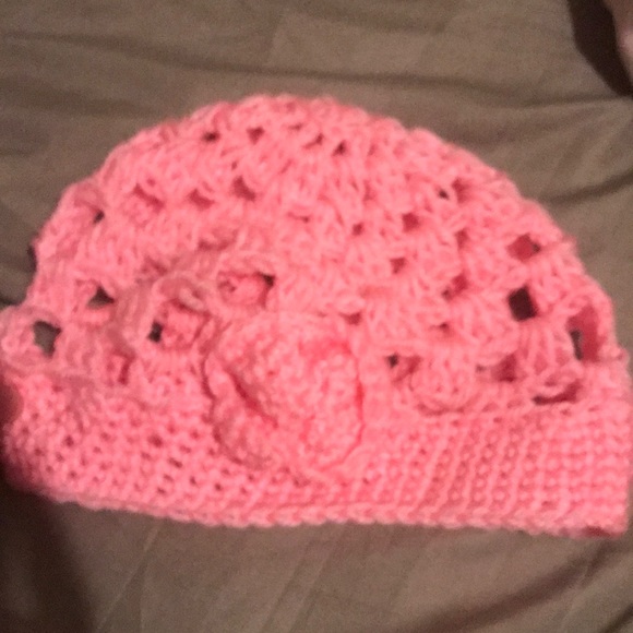 It is a pink hat and cozy to wear for the winter. - Picture 1 of 3